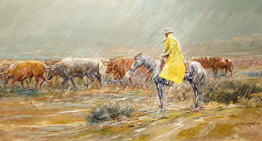 One of the artworks on display at the Western Heritage Center is a painting by J.K. Ralston.