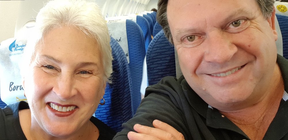 Ros and Alan boarding the flight to begin our roving retirement lifestyle