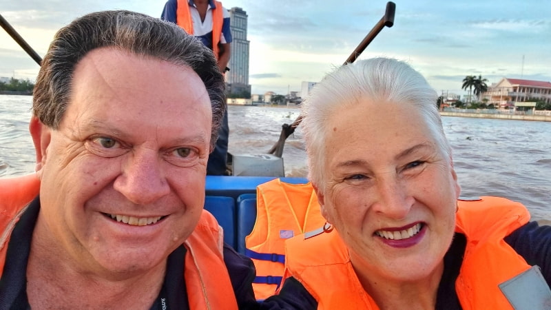 Vietnam tours from Australia Ros and Alan watching the sun rise on the Mekong Delta