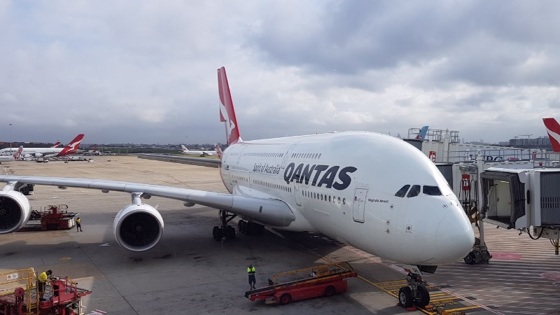 Internet When Travelling Qantas Airbus A380 at Sydney Airport gate during boarding and ground crew operations.